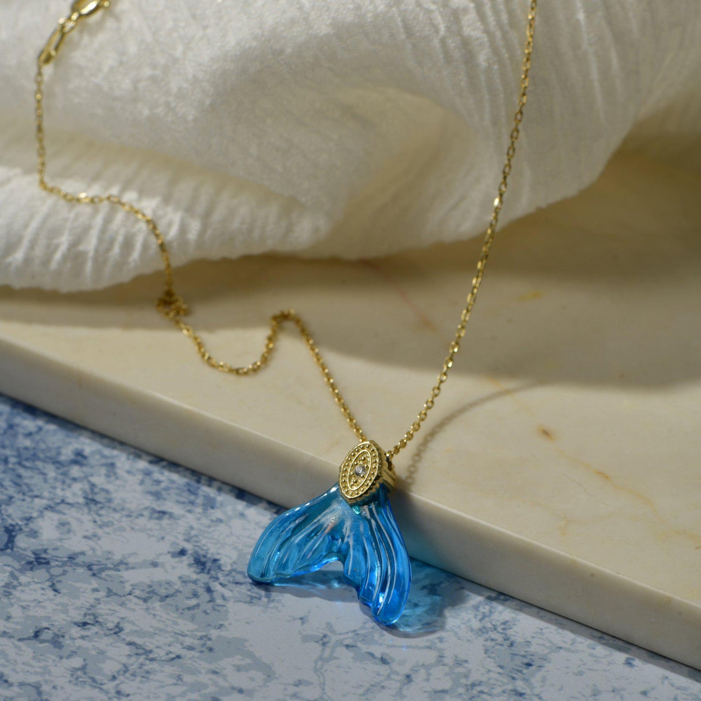 Glass Carved Whale Tail Necklace