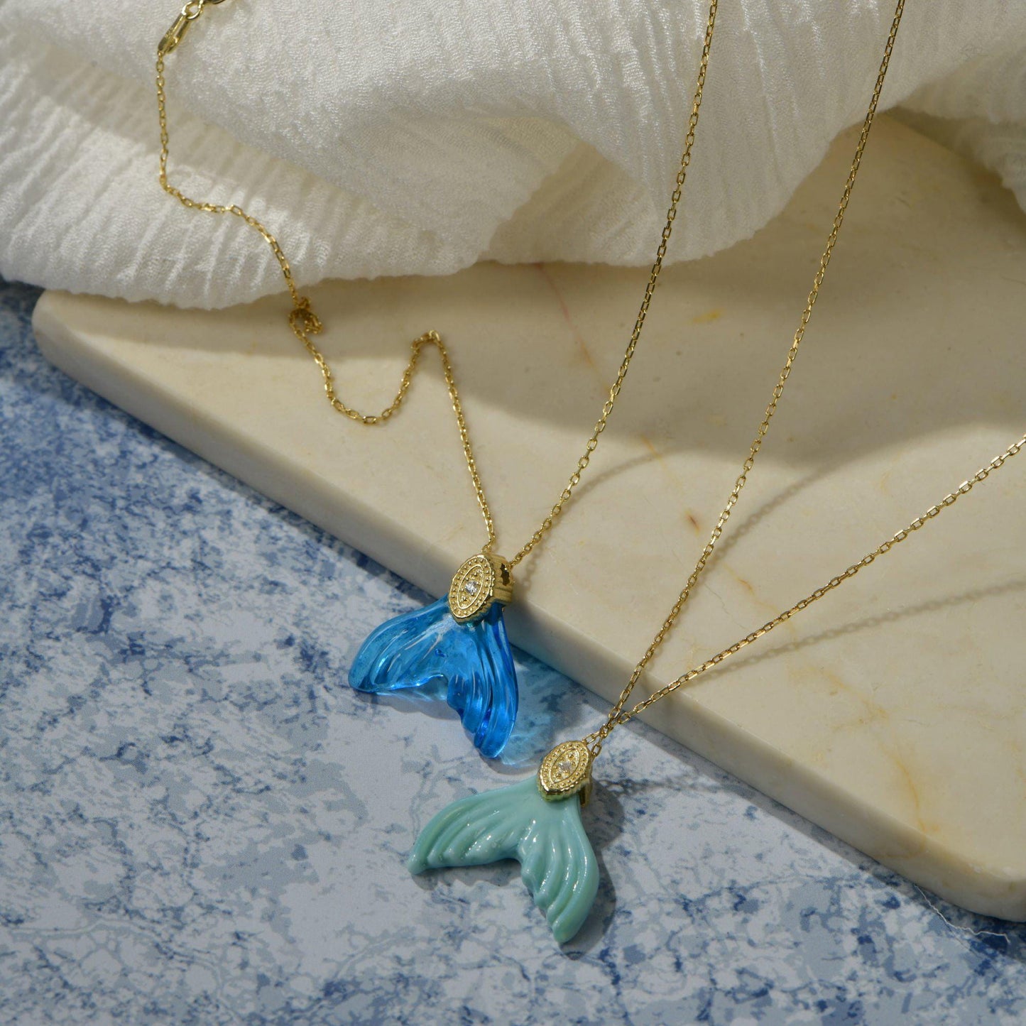 Glass Carved Whale Tail Necklaces